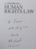 The Handbook of Human Rights Law (Inscribed by Author) | Michael Arnheim